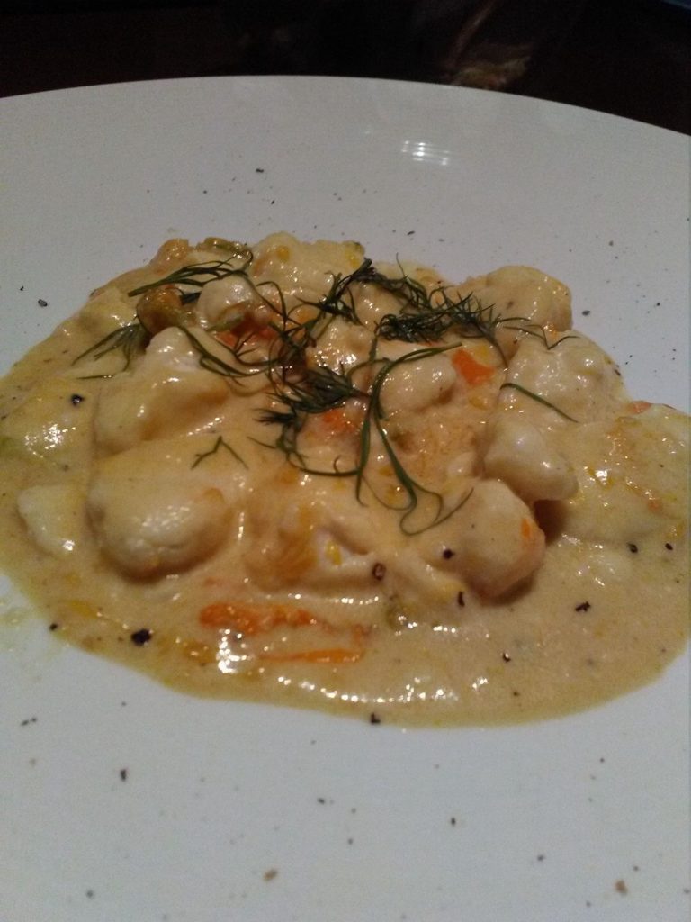 Gnocchetti di ricotta con fiori di zucca in salsa all’arancia
