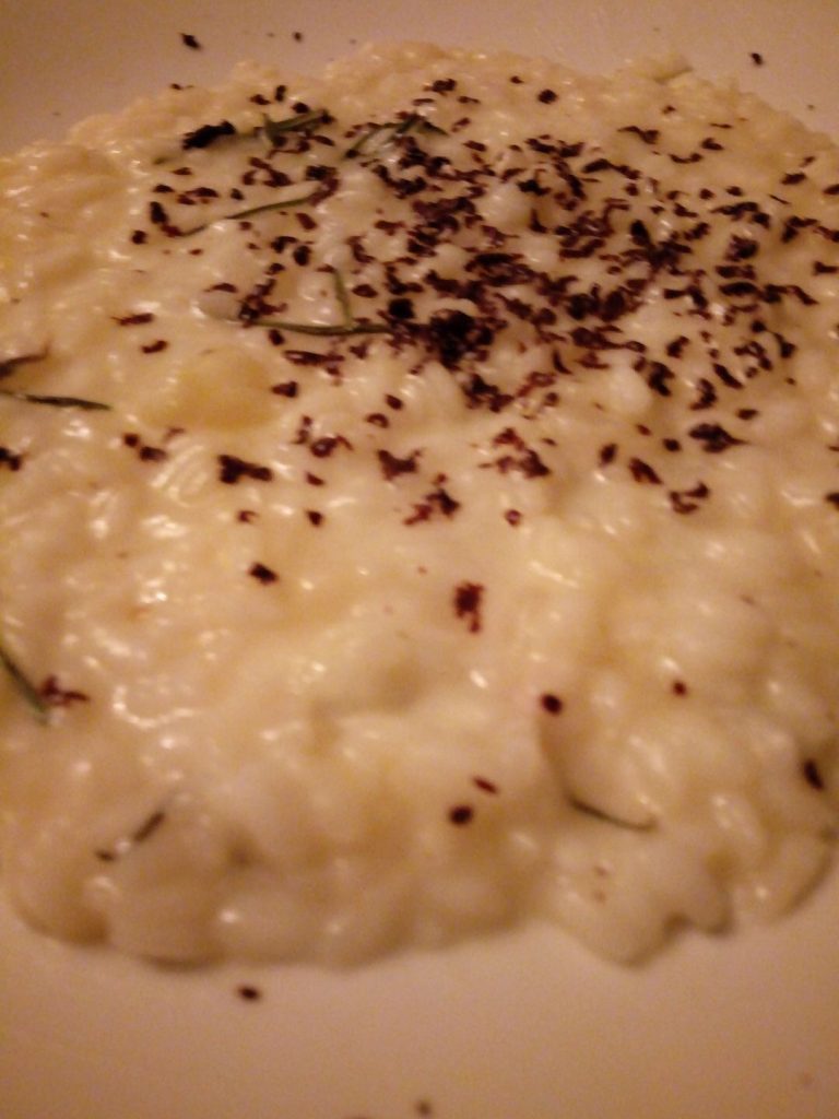 Risotto pera e cioccolato mantecato alla crema di taleggio